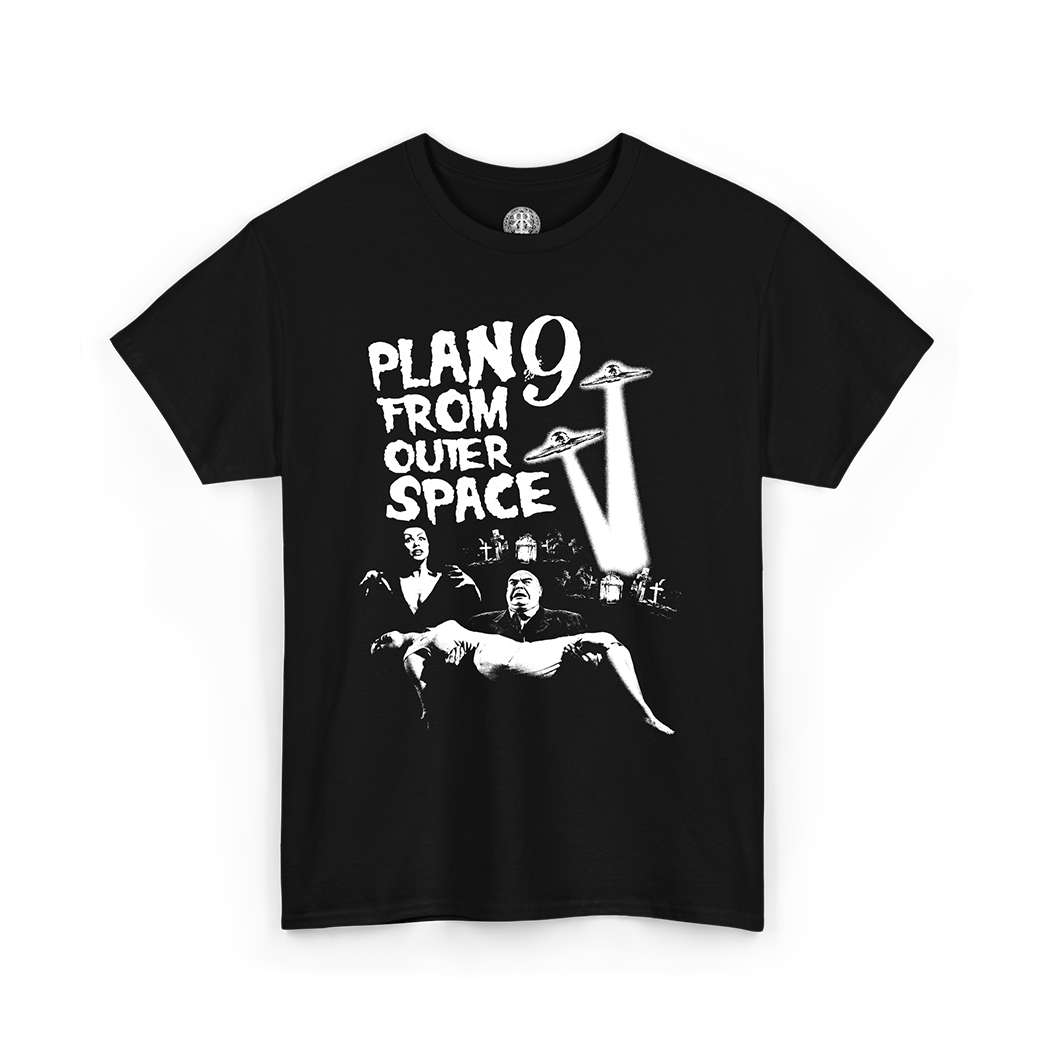 A black short-sleeve crewneck t-shirt with a white graphic print on the front. The graphic features the text 'PLAN 9 FROM OUTER SPACE' in a bold, stylized font, accompanied by illustrations of a flying saucer, a rocket ship, and a retro-futuristic scene with figures.