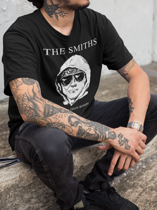 Tattoed man wearing The Smiths Louder Than Bombs T-Shirt