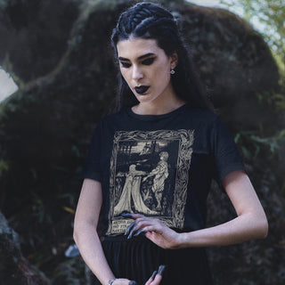 Woman wearing Arthur and the Strange Mantle t-shirt.