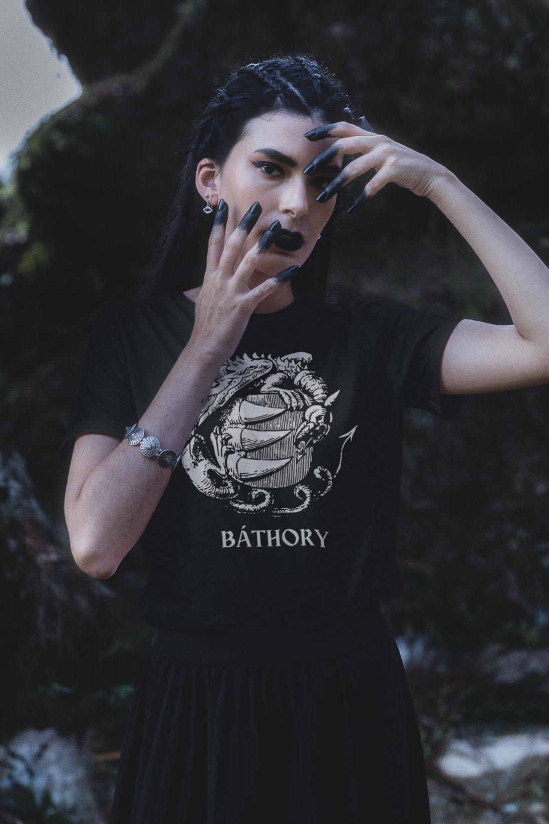 Woman wearing shirt showing Bathory Coat of Arms