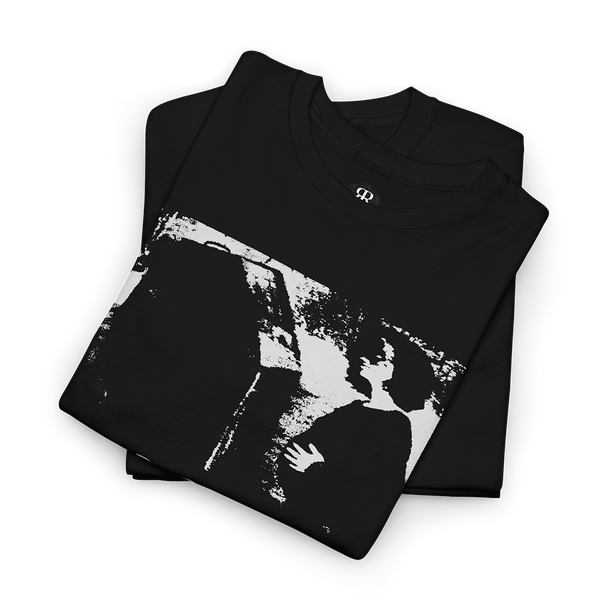 Begotten T-Shirt, showing a scene from a movie of a pregnant woman with a mask beside a coffin