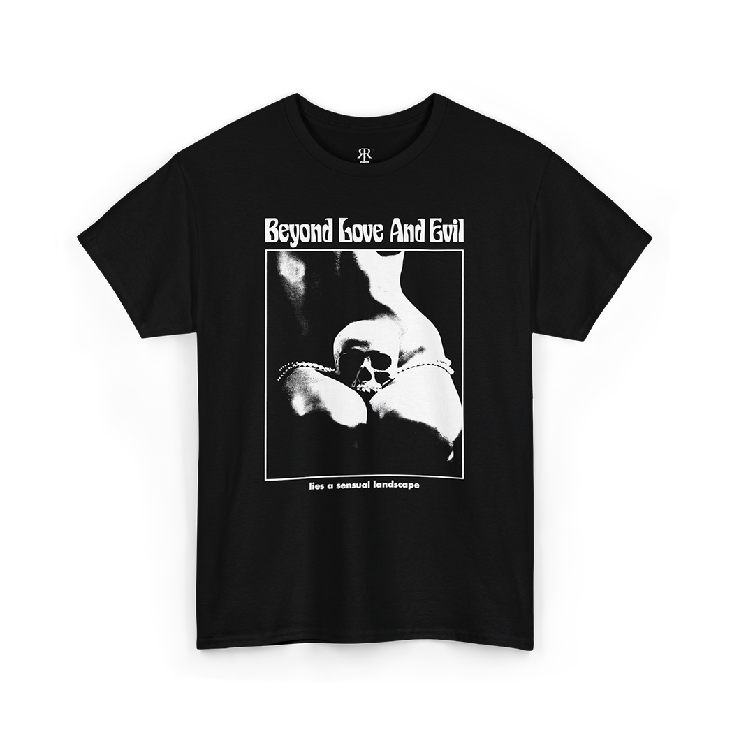 Black t-shirt with a print of a woman with human skull in her lap and text 'Beyond Love And Evil lies a sensual landscape'