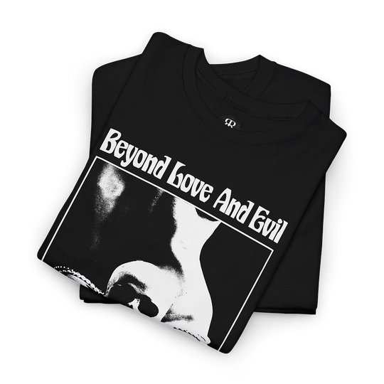 Black t-shirt with a print of a woman with human skull in her lap and text 'Beyond Love And Evil lies a sensual landscape'