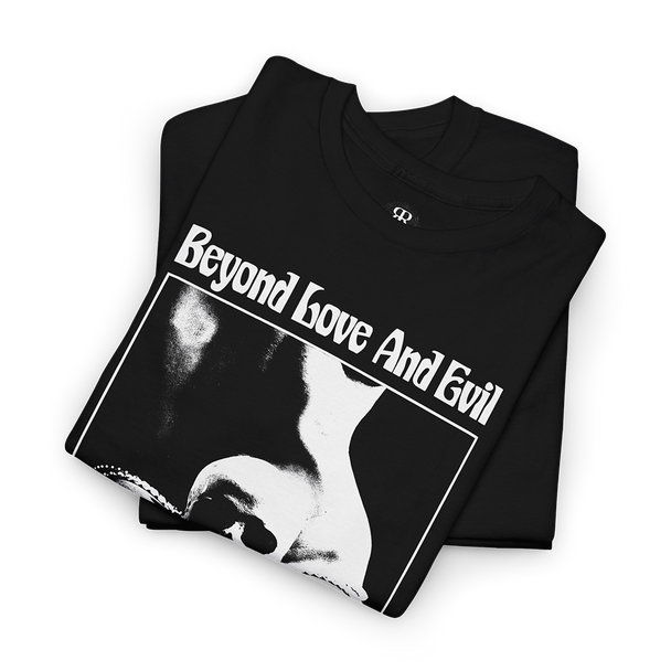 Black t-shirt with a print of a woman with human skull in her lap and text 'Beyond Love And Evil lies a sensual landscape'
