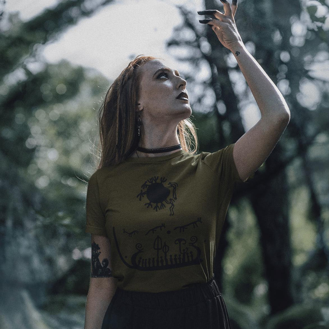 Woman wearing olive green Tanum Rock T-Shirt