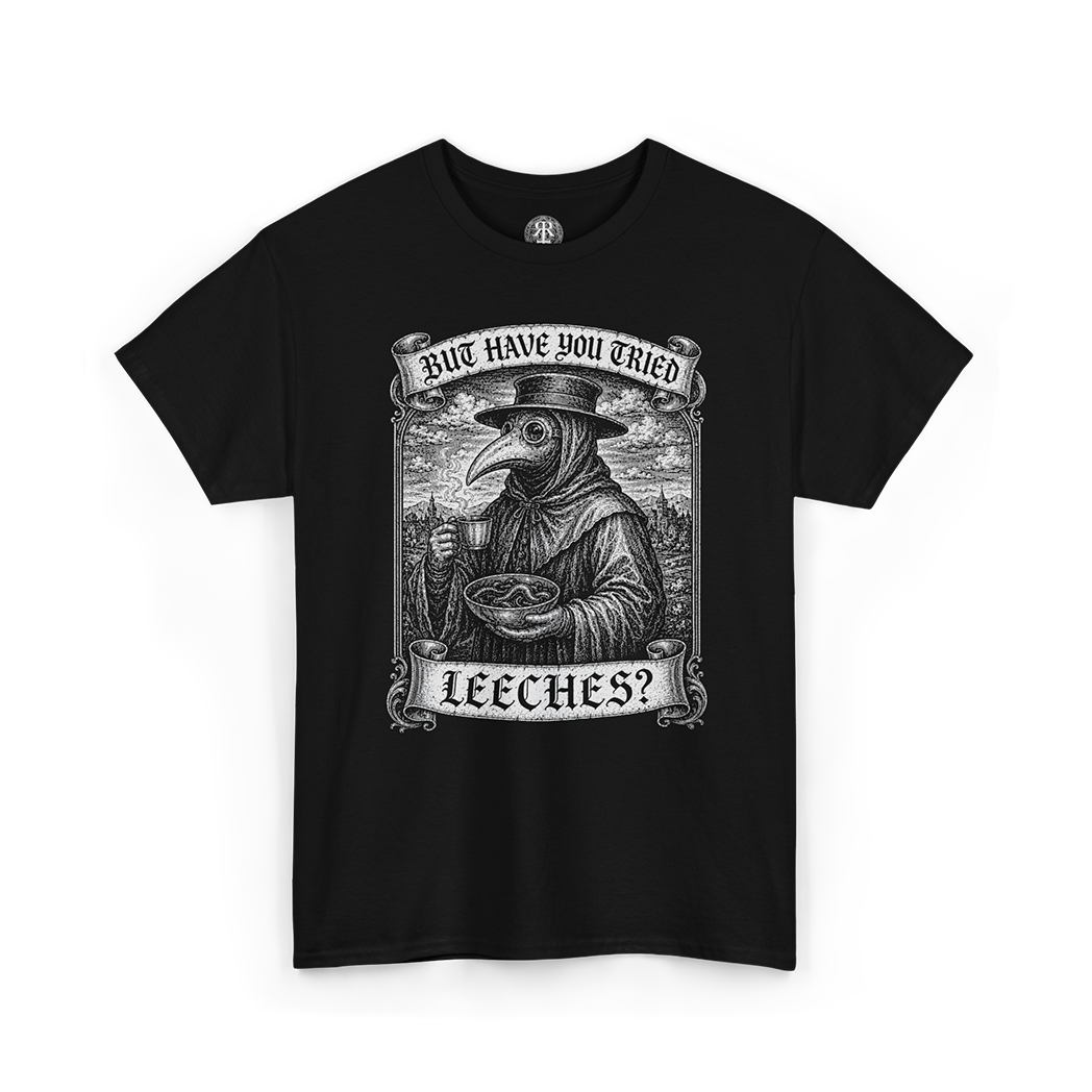 A black short-sleeve crewneck t-shirt featuring a detailed black and white graphic print of a plague doctor holding a glass, with banners reading 'HAVE YOU TRIED LEECHES?'.
