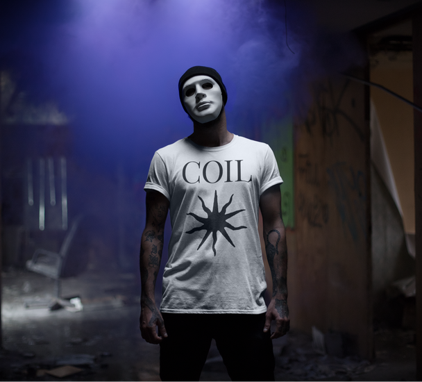 Man wearing white Coil Black Sun T-Shirt