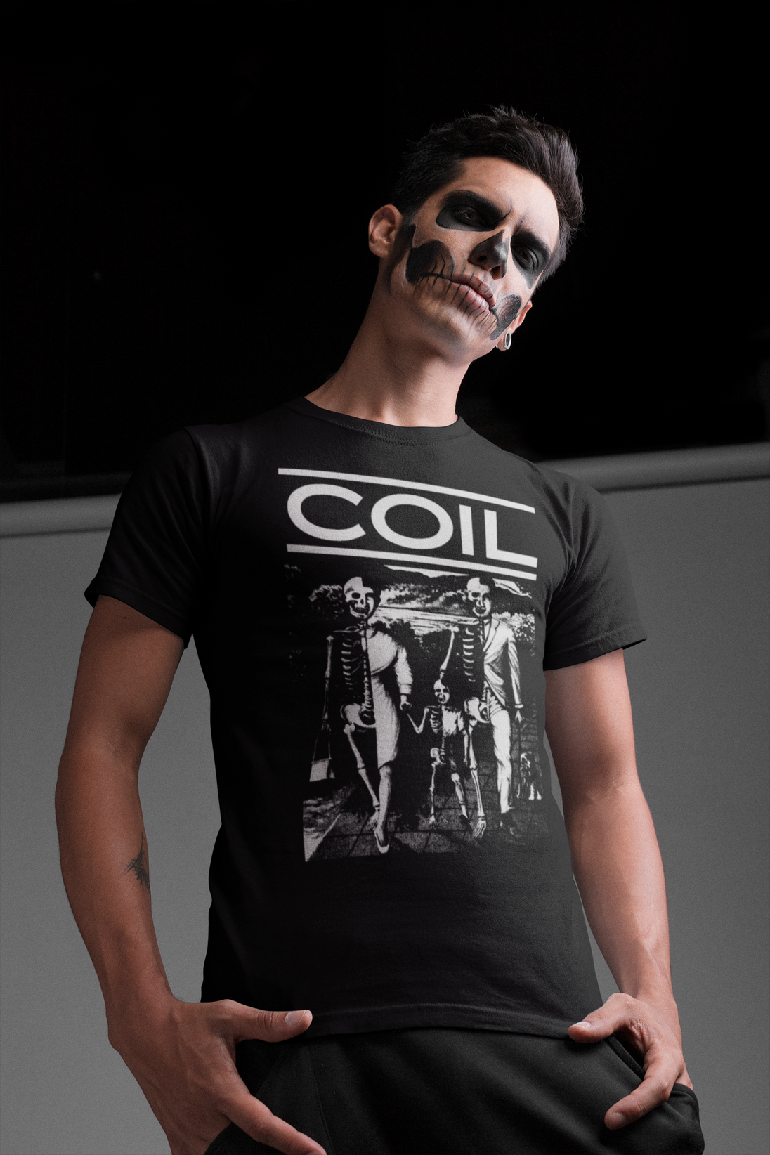 Man wearing Coil Unnatural History T-Shirt