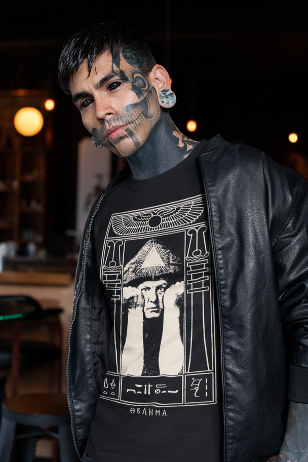 Tattooed man wearing Aleister Crowley Thelema T-Shirt