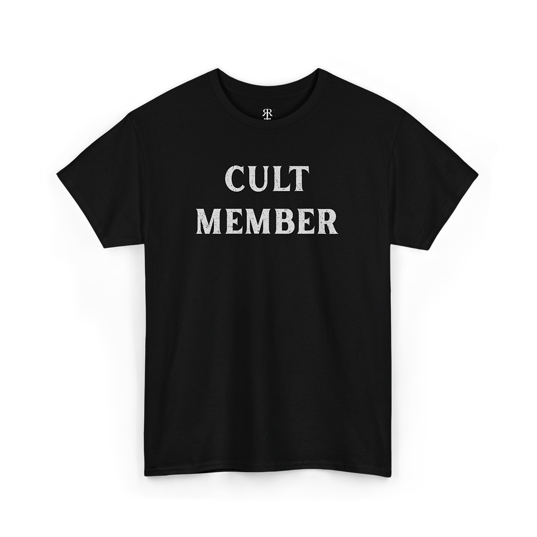 This image displays a stylish black T-shirt featuring the phrase "CULT MEMBER" prominently printed in white text across the chest.