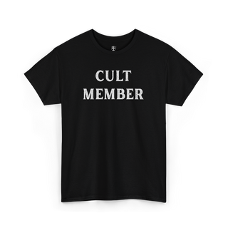 This image displays a stylish black T-shirt featuring the phrase "CULT MEMBER" prominently printed in white text across the chest.