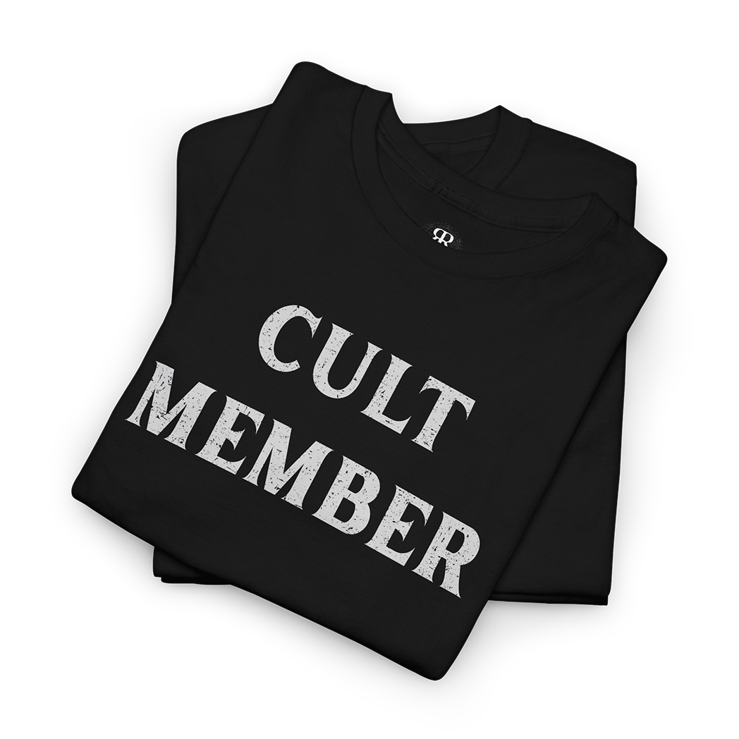 This image displays a stylish black T-shirt featuring the phrase "CULT MEMBER" prominently printed in white text across the chest.