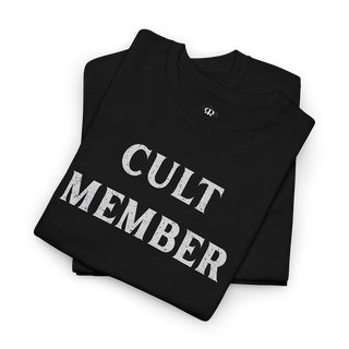 This image displays a stylish black T-shirt featuring the phrase "CULT MEMBER" prominently printed in white text across the chest.