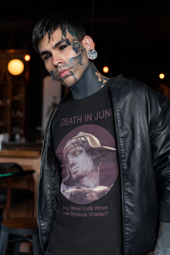 Tattooed man wearing Death in June shirt
