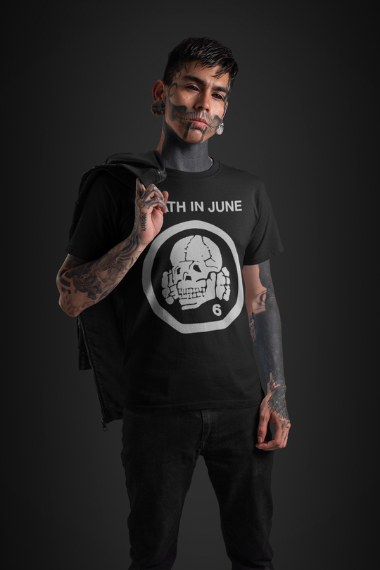 Tattooed man wearing Death in June Totenkopf shirt