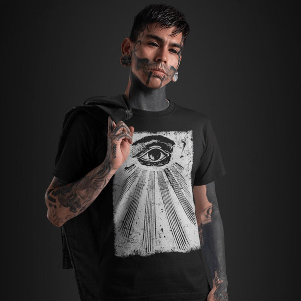 Person wearing a black All Seeing Eye T-Shirt on a dark background
