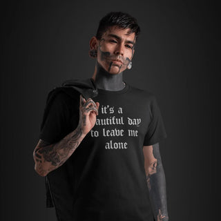 Tattoed man wearing It's A Beautiful Day To Leave Me Alone T-Shirt