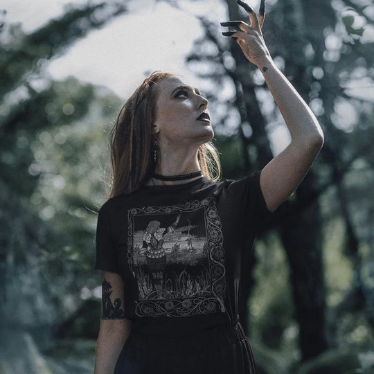 Woman in forest setting wearing La Mort D'Arthur T-Shirt
