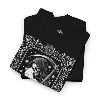 A black folded t-shirt with a detailed black and white graphic of a grim reaper holding a cat, set against a plain white background.