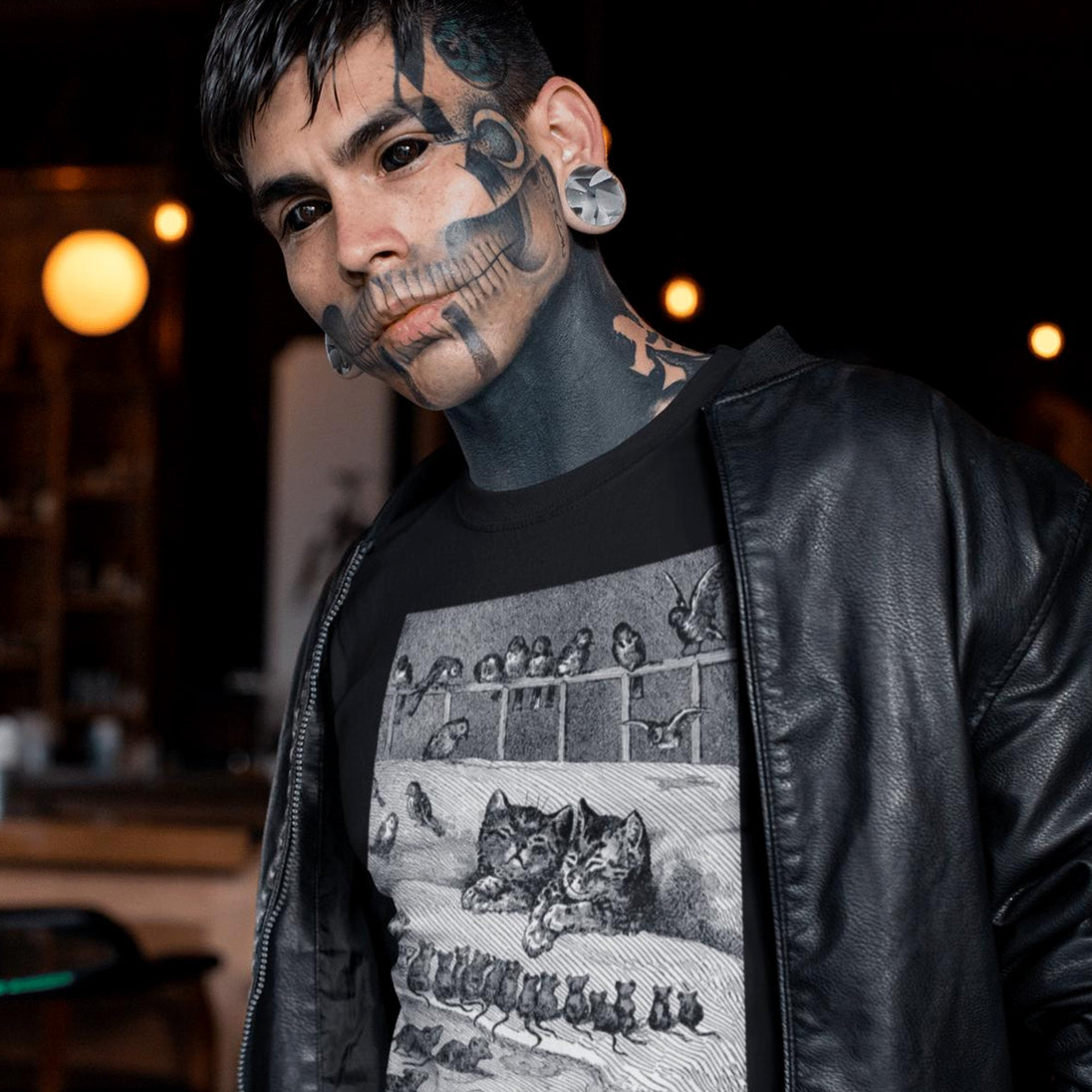 Man wearing Debilitatingly Cozy Cats T-Shirt