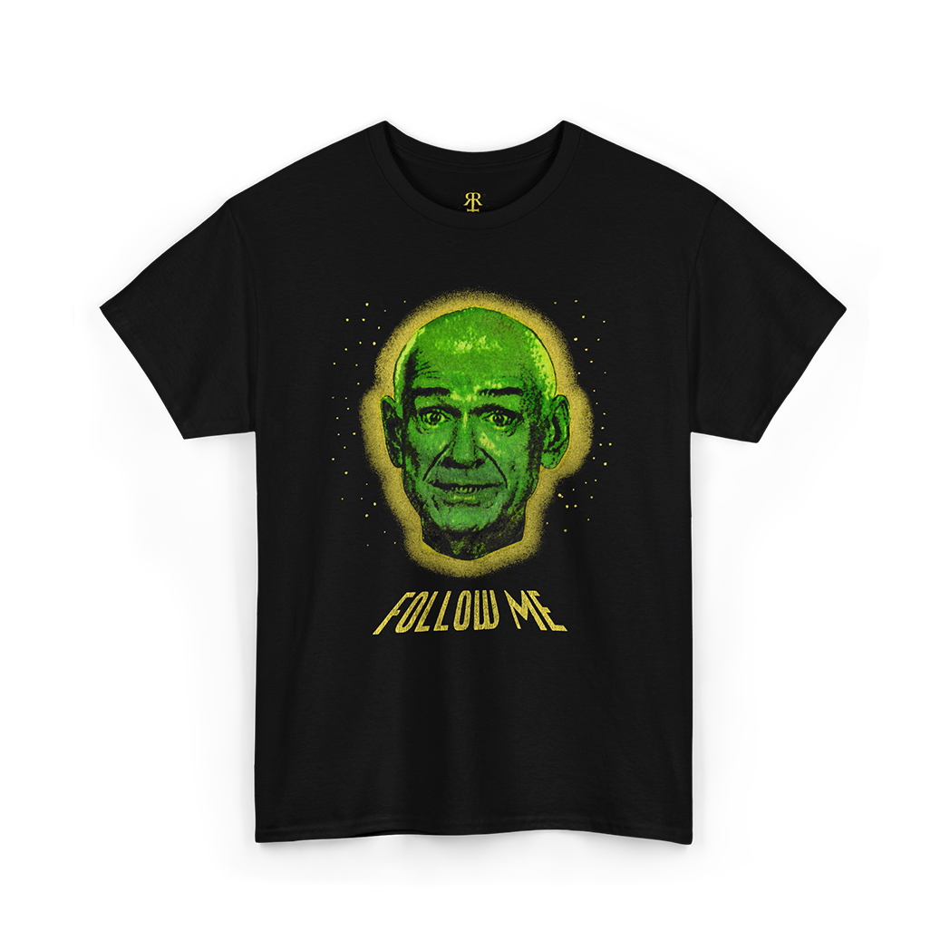 Black t-shirt with a green graphic and 'Follow Me' text on a white background