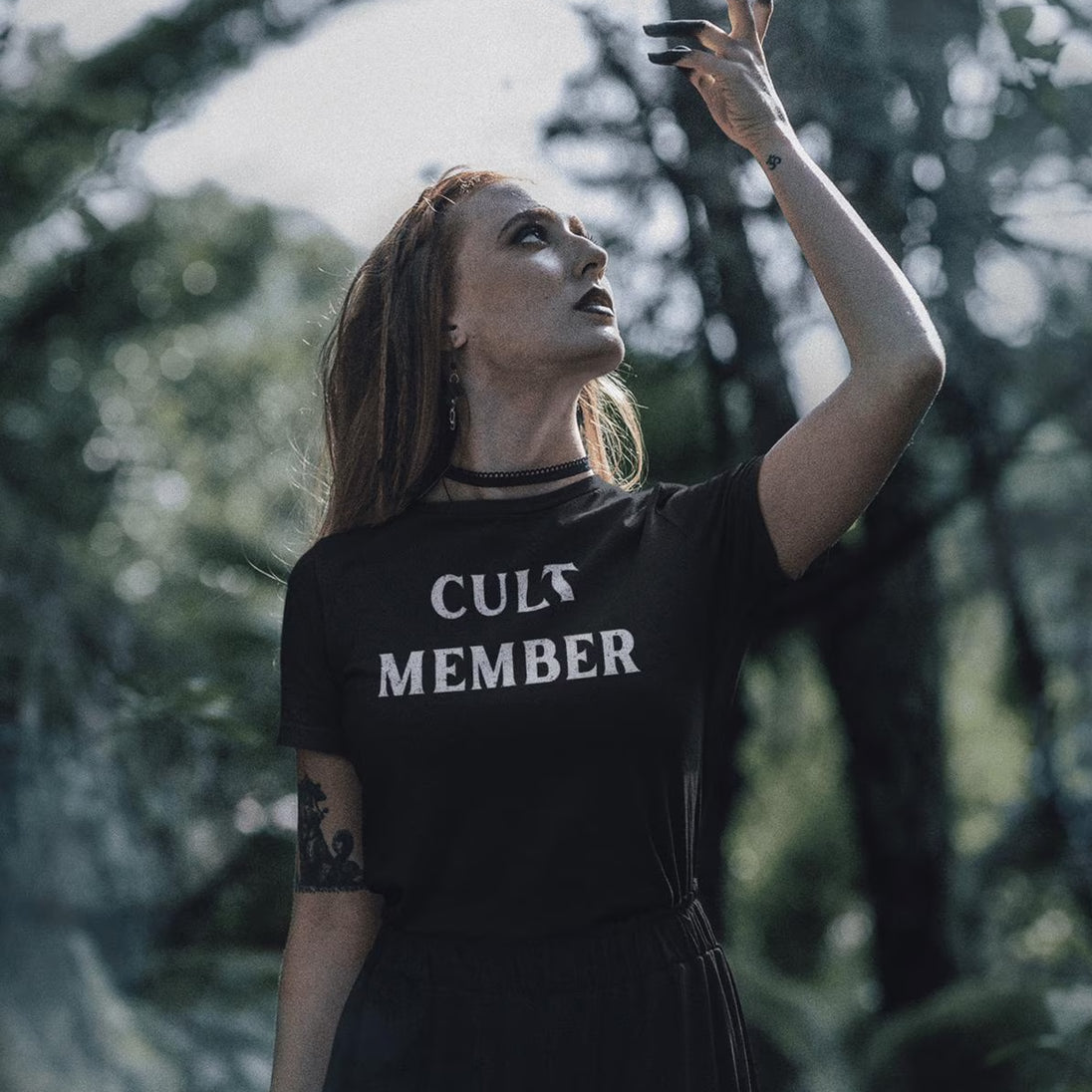 Woman wearing Cult Member T-Shirt