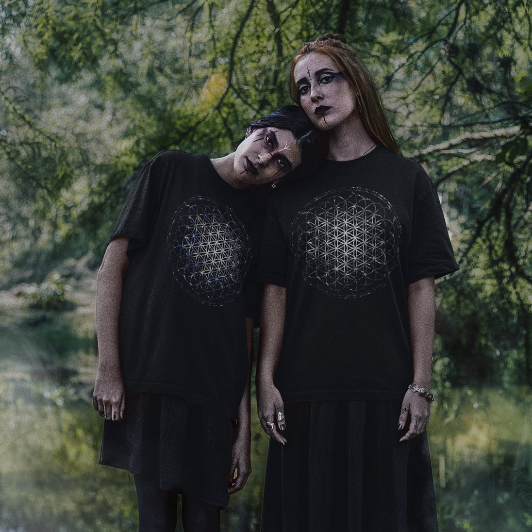 Women wearing Flower of Life T-Shirt in forest setting