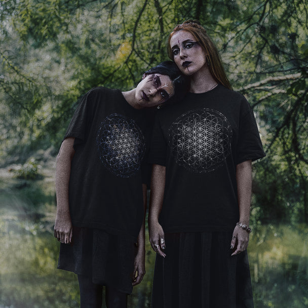 Women wearing Flower of Life T-Shirt in forest setting