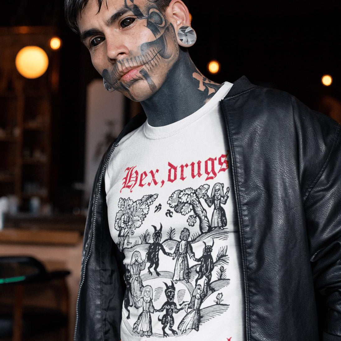Tattooed man wearing white Hex Drugs and Mind Control T-Shirt
