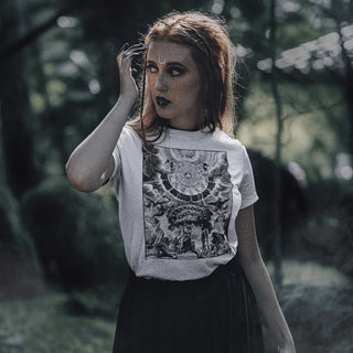 Woman wearing white Alchemical Tree of Life T-Shirt in forest setting