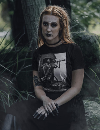 Woman wearing Skeletons Playing Flute T-Shirt in forest setting