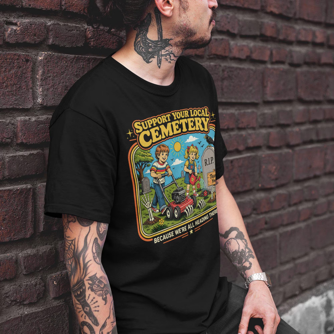Tattooed man wearing Support Your Local Cemetery Retro T-Shirt