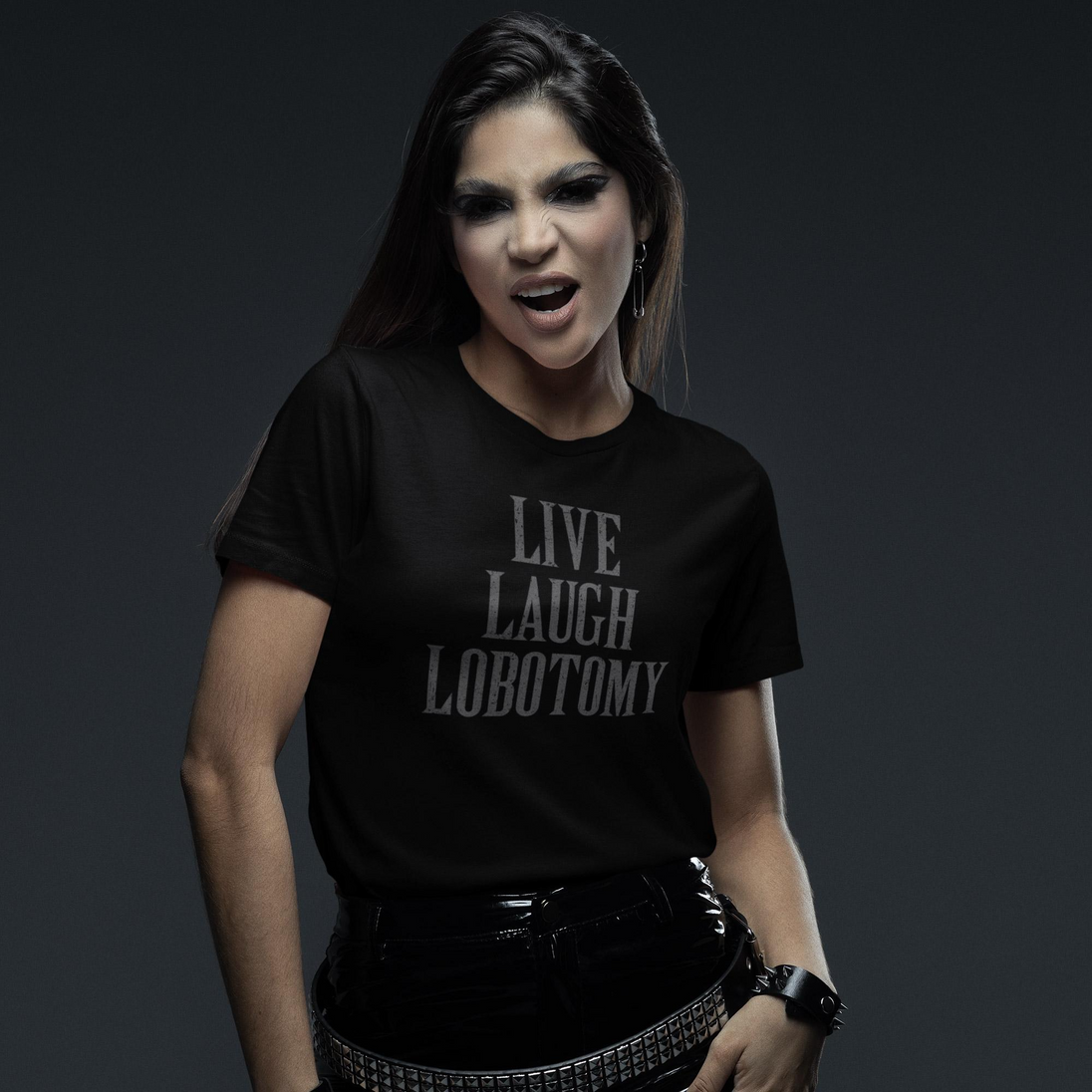 Person wearing a black t-shirt with 'LIVE LAUGH LOBOTOMY' text on a dark background