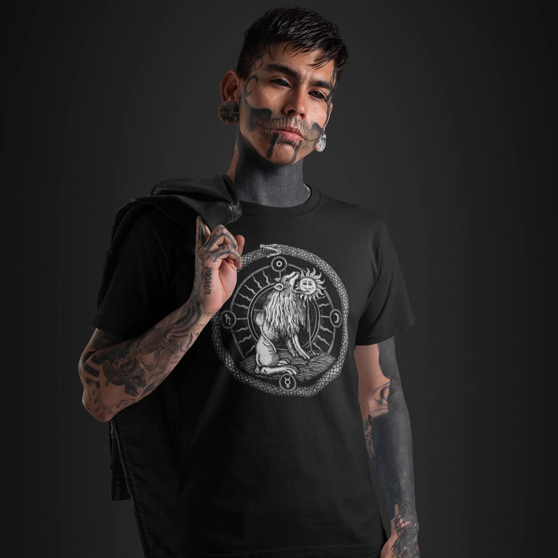 Tattooed man wearing Green Lion Devouring the Sun T-Shirt