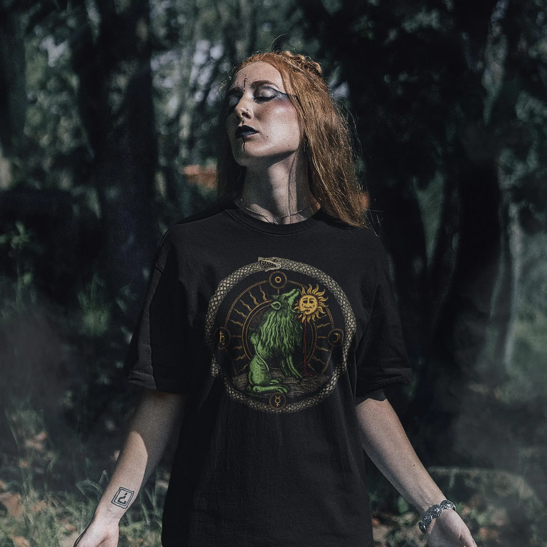 Woman wearing Green Lion Devouring the Sun T-Shirt