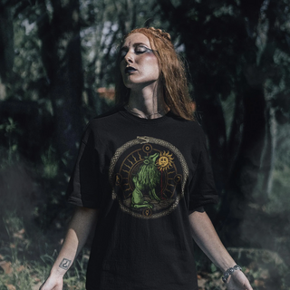 Woman wearing Green Lion Devouring the Sun T-Shirt