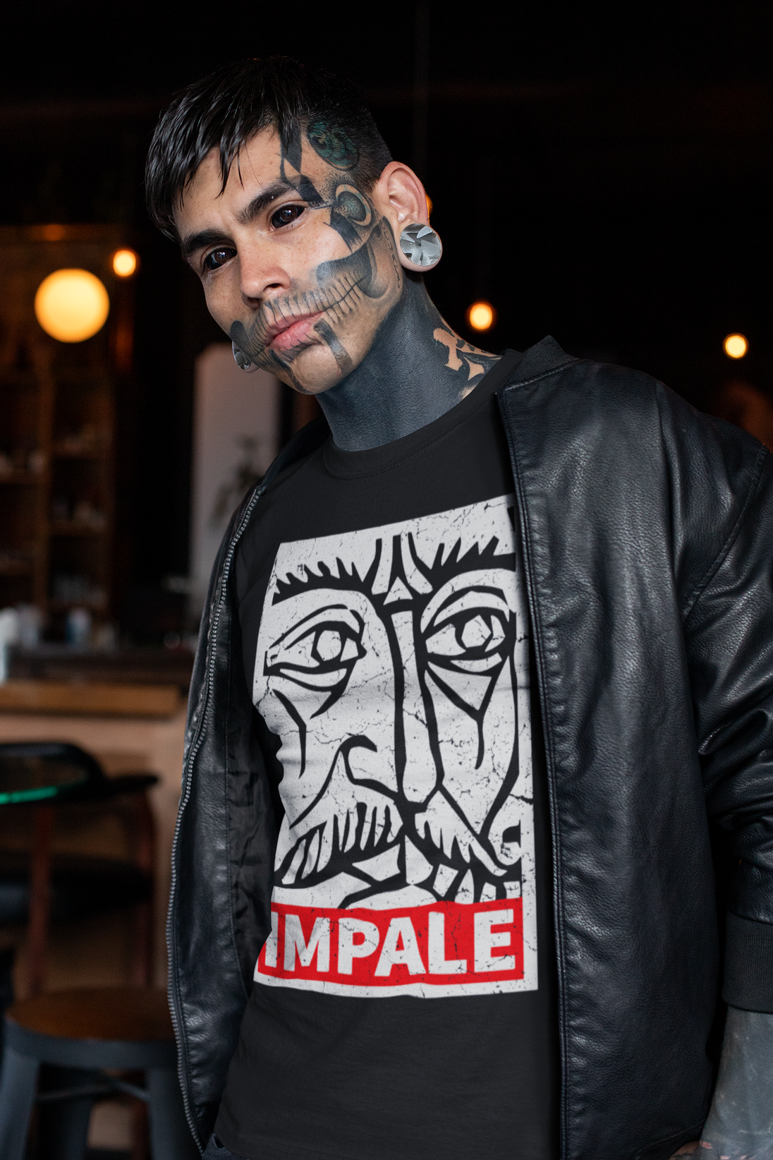Man wearing shirt showing Vlad Tepes with statement IMPALE
