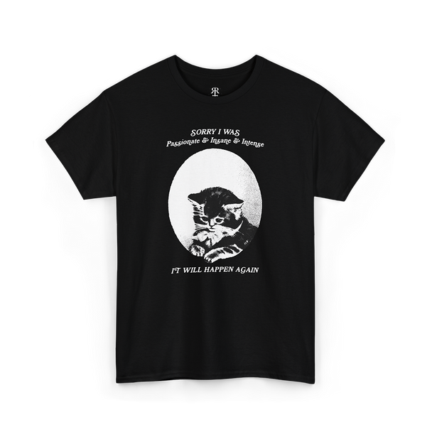 A black T-shirt with a graphic of a cat's face in the center and the text 'Sorry, I was just being my purrfectly passionate, intense, and slightly insane self