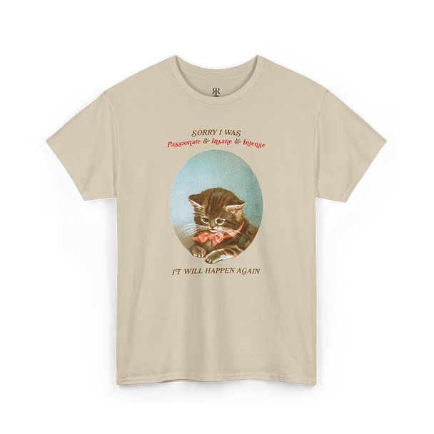 A sand T-shirt with a graphic of a cat's face in the center and the text 'Sorry, I was just being my purrfectly passionate, intense, and slightly insane self