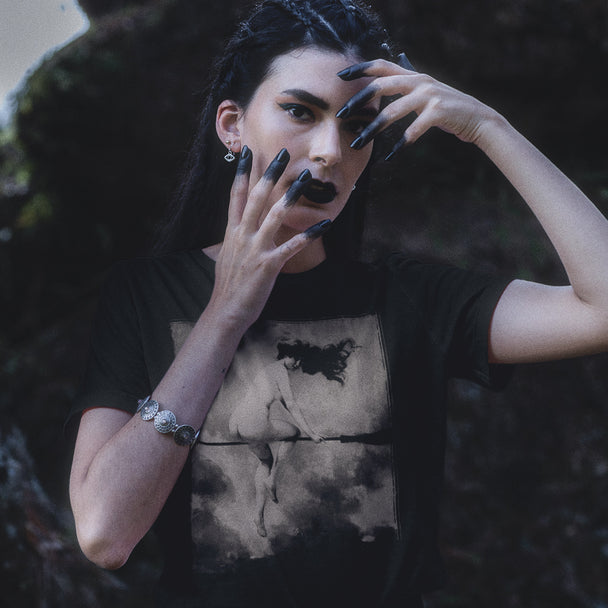 Woman wearing Départ Pour Le Sabbat T-Shirt