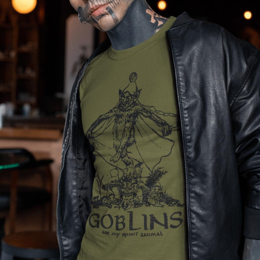 Man wearing olive green Goblins are my Spirit Animal T-Shirt
