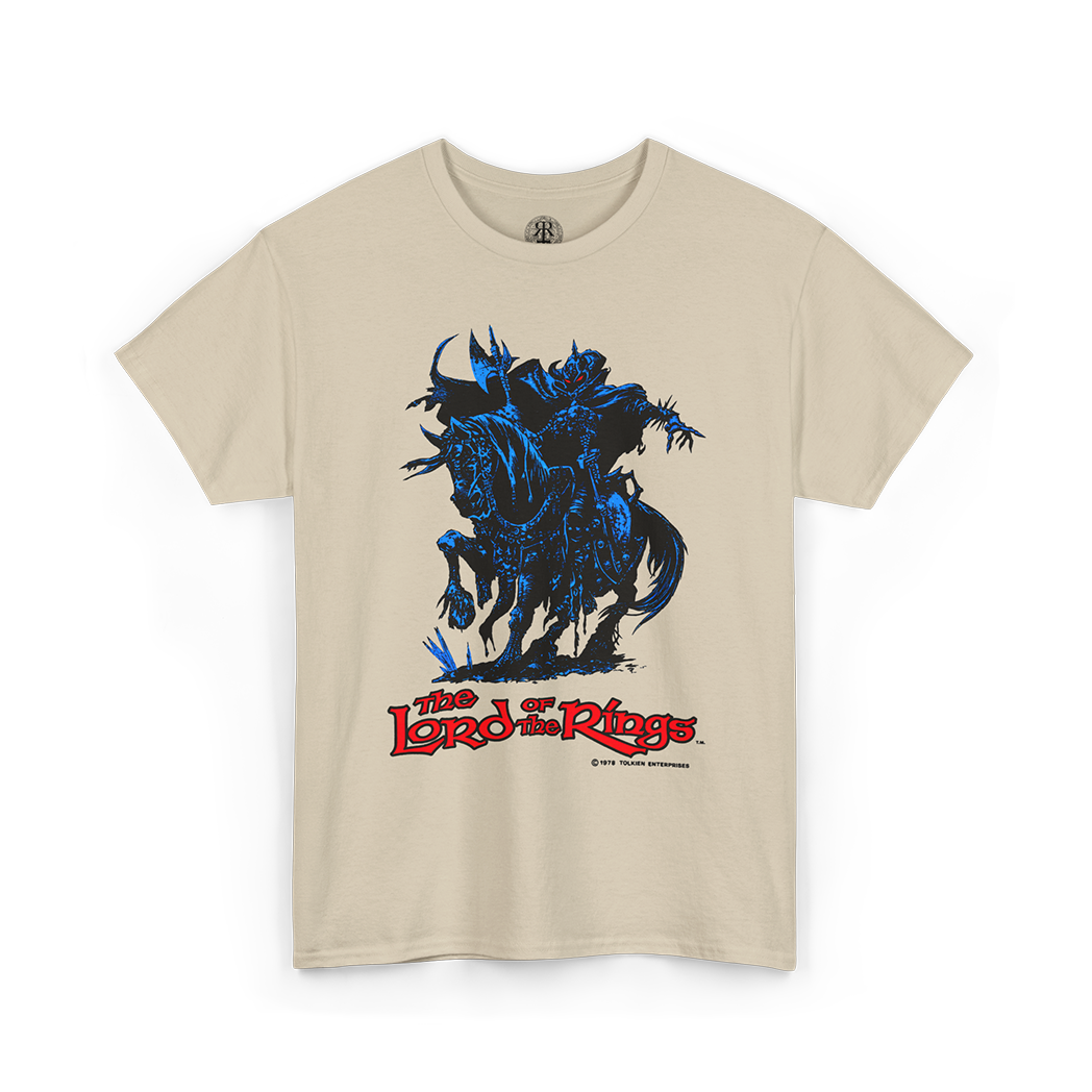 A beige short-sleeve t-shirt featuring a graphic print of the character Morghulis on a dark blue horse, with 'The Lord of the Rings' logo printed in red below, displayed against a solid white background.