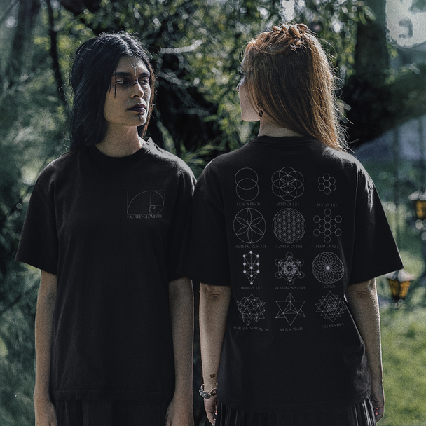 Two women wearing Sacred Geometry T-Shirt in forest setting