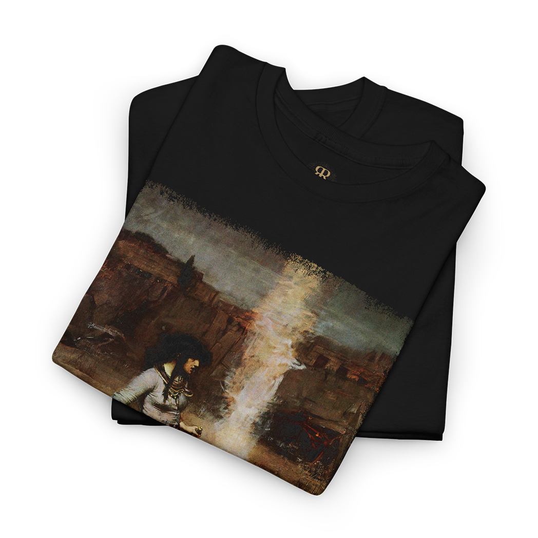 A black T-shirt featuring a printed image of a witchcraft scene with a woman, a cauldron, and a staff.