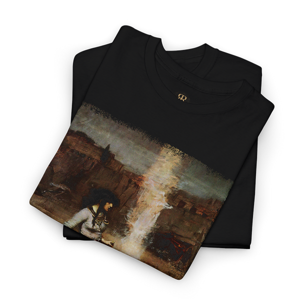 A black T-shirt featuring a printed image of a witchcraft scene with a woman, a cauldron, and a staff.