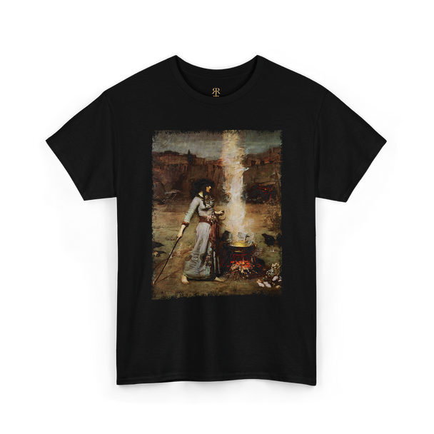 A black T-shirt featuring a printed image of a witchcraft scene with a woman, a cauldron, and a staff.