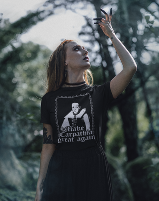 Woman wearing shirt showing Elisabeth Bathory with saying 'Make Carpathia Great Again'