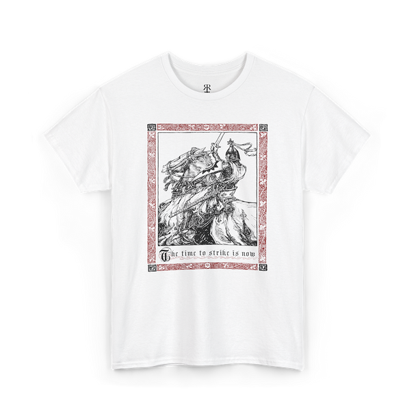 A white t-shirt with a medieval knight design, featuring a depiction of a knight on horseback with a red and gray background and the text 'THE TIME TO STRIKE IS NOW'.