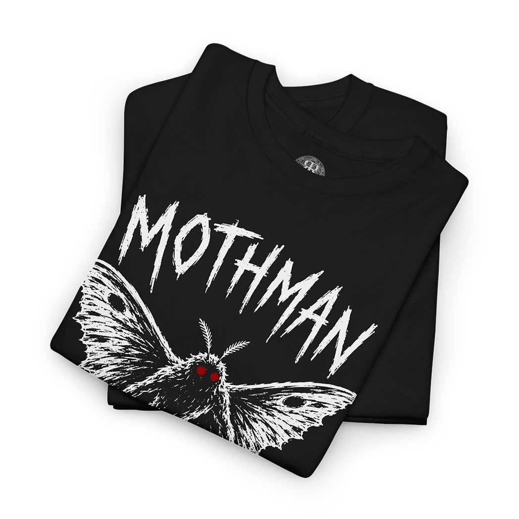 A folded black t-shirt featuring a white distressed graphic of a moth with red eyes and the word 'MOTHMAN' in a jagged white font, shown on a plain white background.