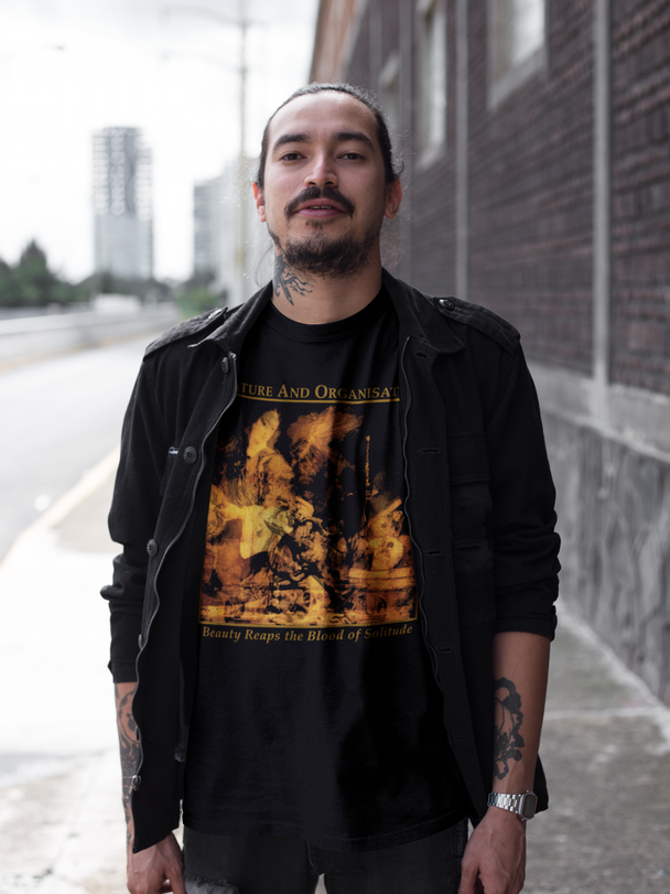 Tattooed man wearing Nature and Organisation Beauty Reaps the Blood of Solitude T-Shirt